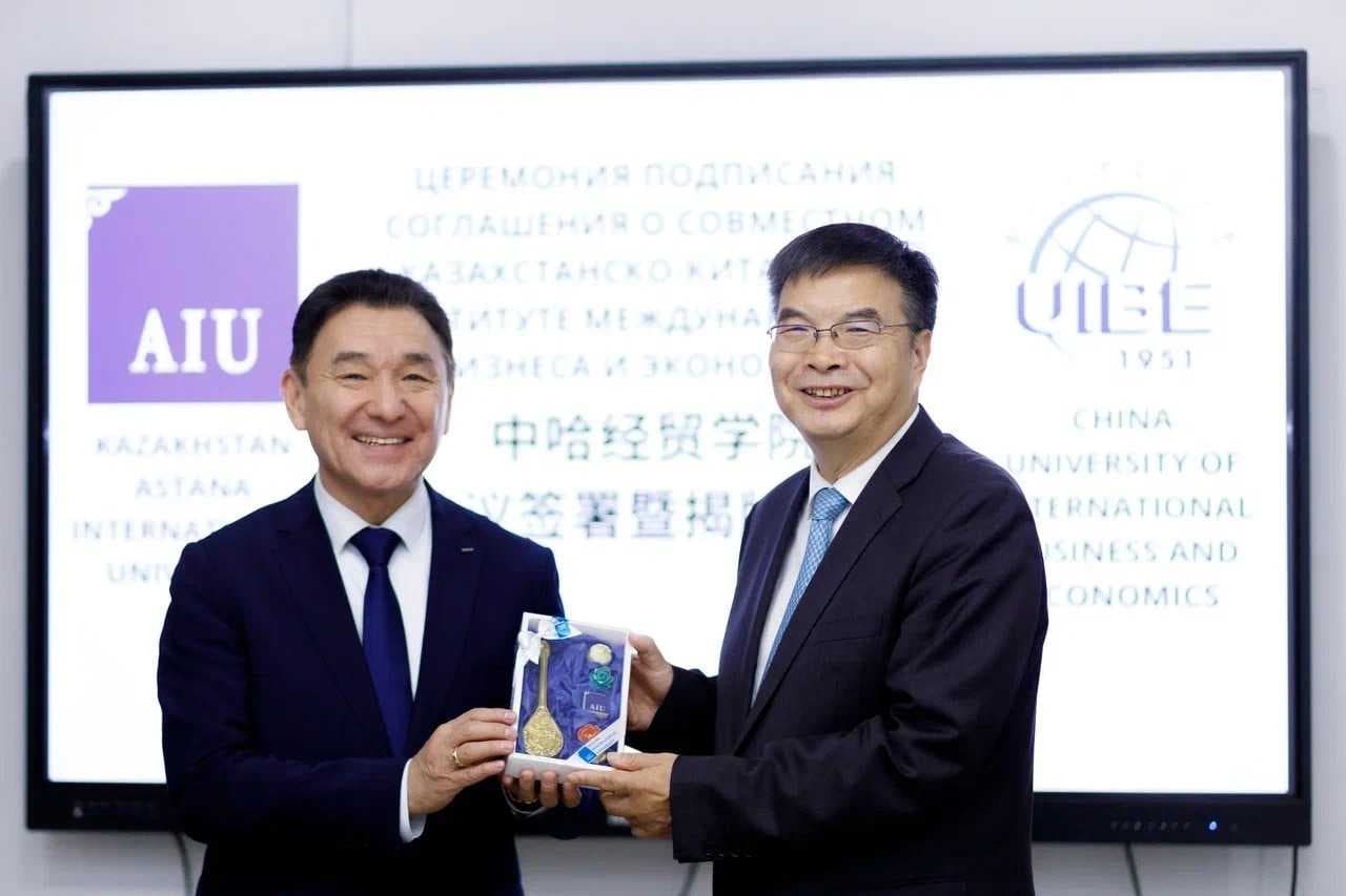 AIU and UIBE: Signing ceremony of the agreement on the joint Kazakh-Chinese Institute of International Business and Economics! ✨ — 1